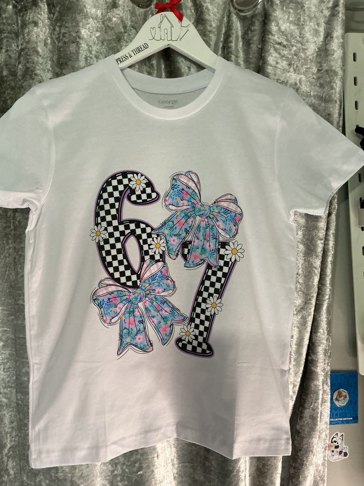 Flower and Bow 67 Children’s t-shirt