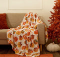 Ultra Soft Pumpkin Bow Print Throw - Cream